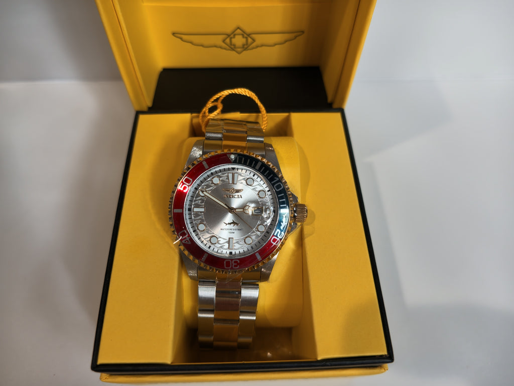 Invicta yellow gift box packaging, Invincible in Detail since 1837
