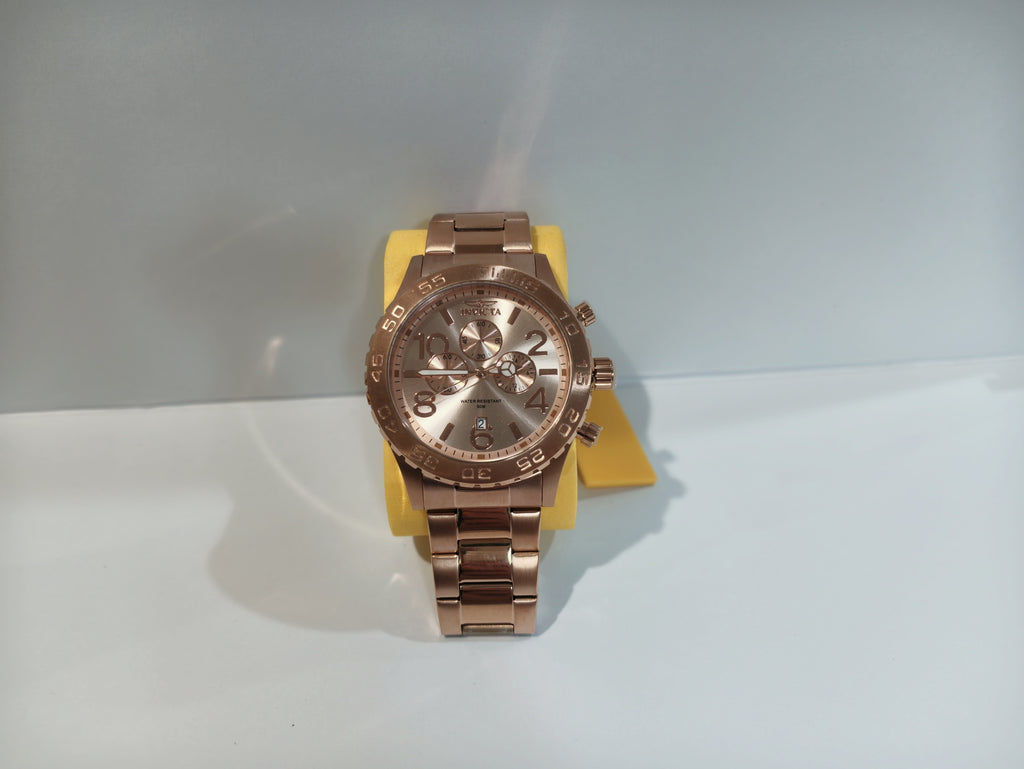 Invicta rose gold chronograph watch standing upright on display cushion