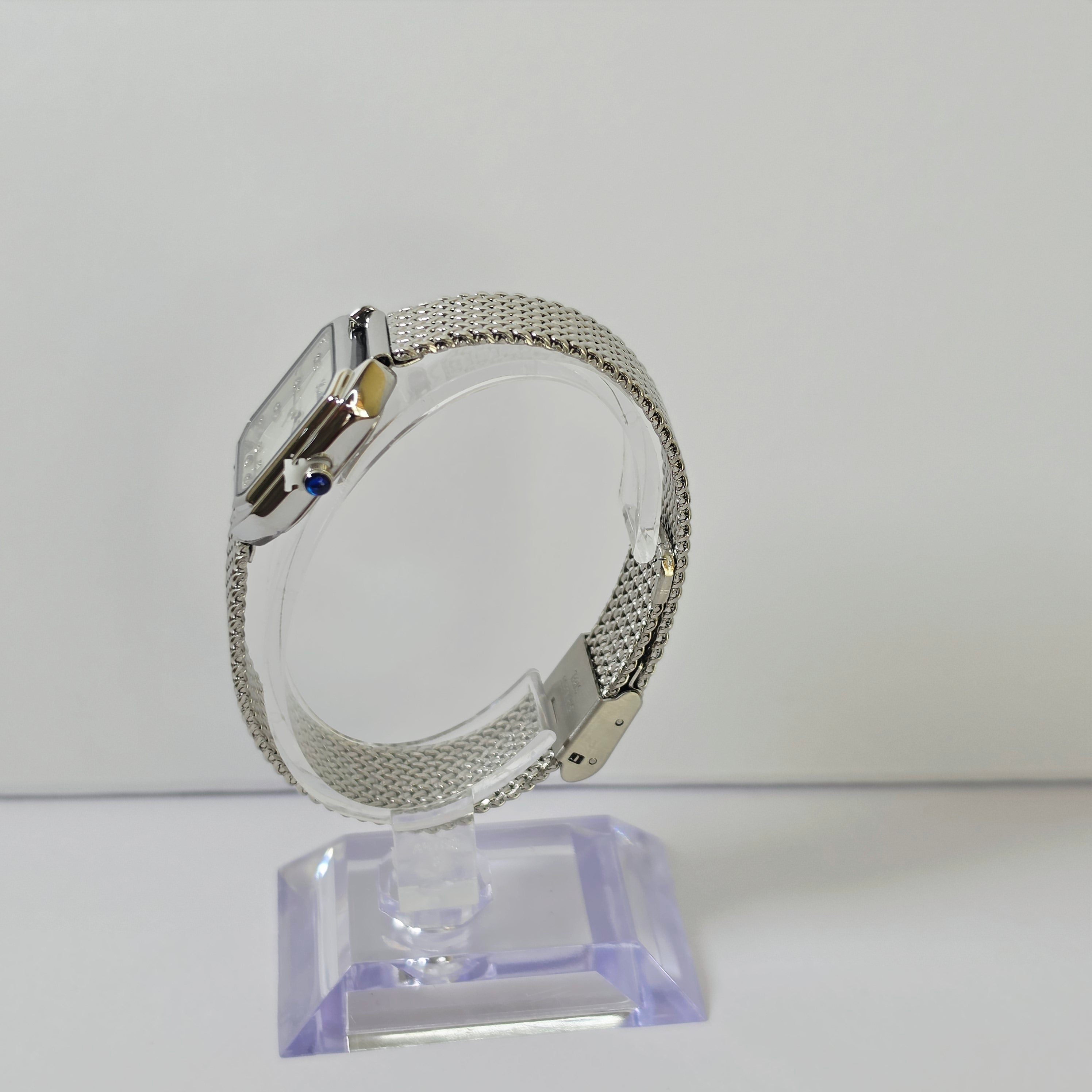 Womens silver square watch white dial on wrist front view woven mesh bracelet