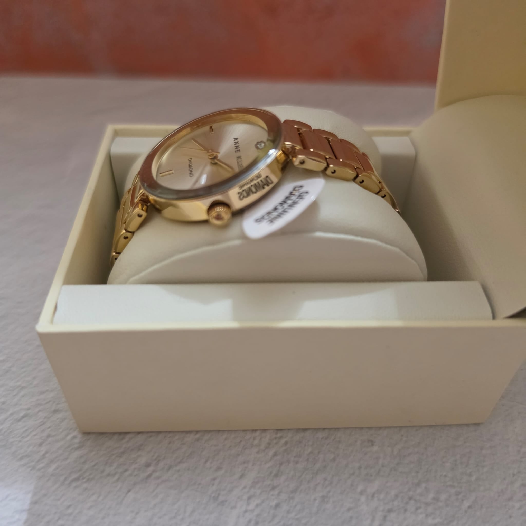 gold tone Anne Klein watch with diamond accent dial brand new in package