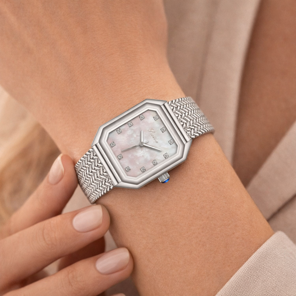 Silver-tone square case
 Elegant crystal hour markers
 Minimalist, easy-to-read dial
 Premium mesh bracelet
 Adjustable jewelry clasp for a secure fit
 Lightweight and comfortable for all-day wear

