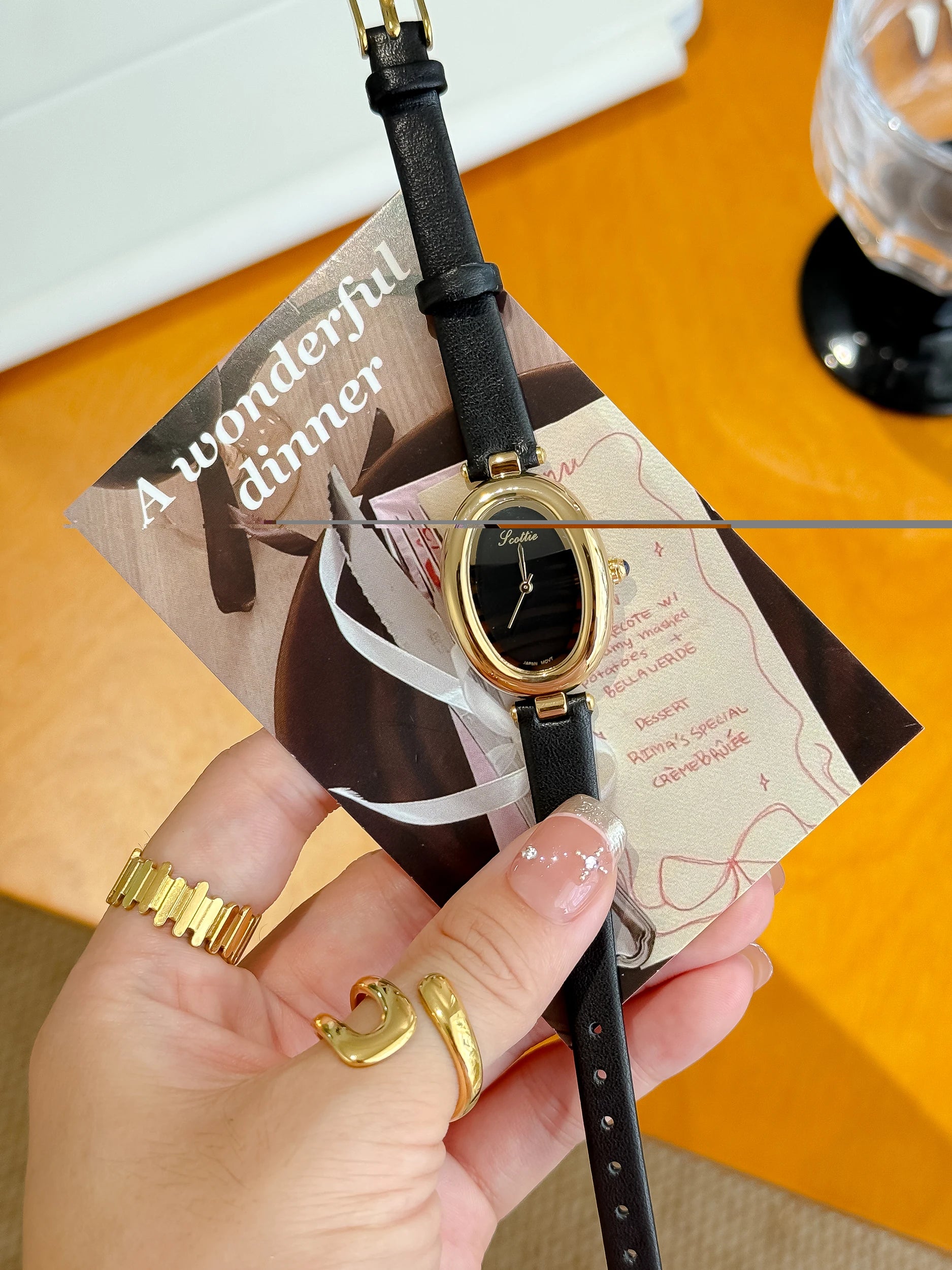 women’s oval watch

black and gold women’s watch

minimalist women’s watch

elegant women’s watch

ladies fashion watch